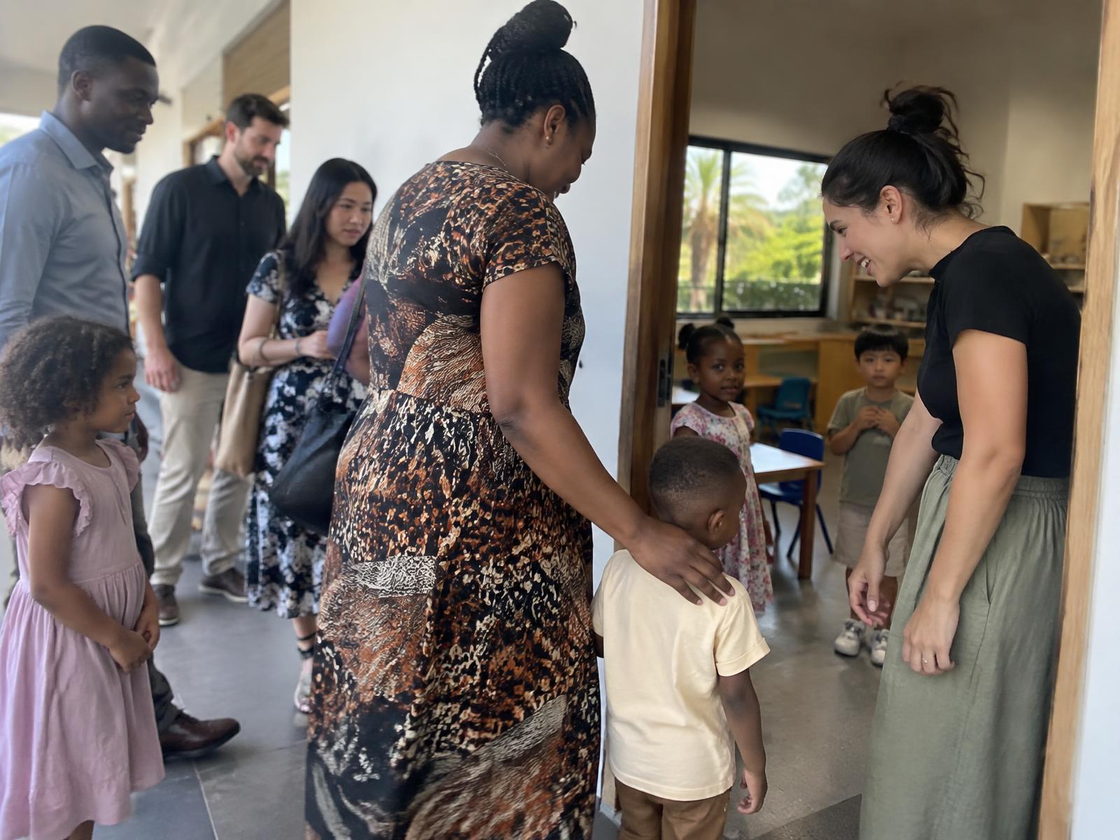 A parent bringing a child to a God’s Tribe Sunday class